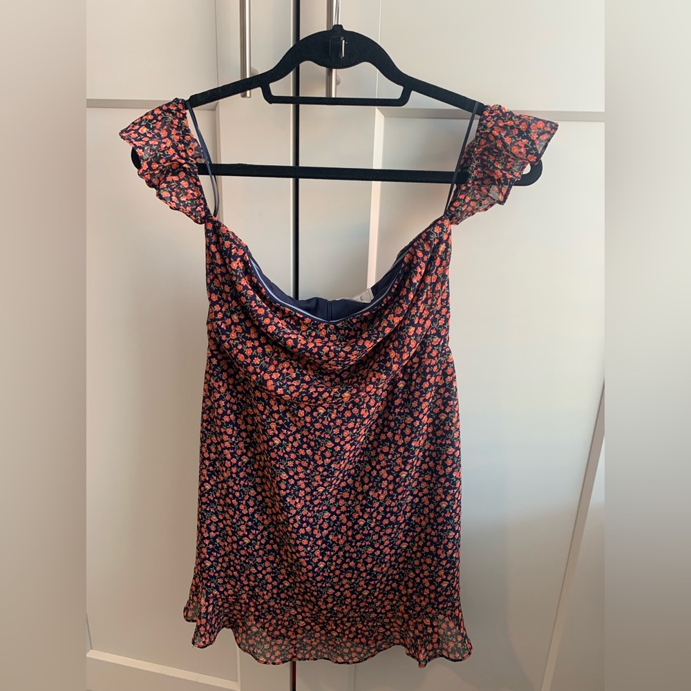 Sage the Label navy strapless dress with pink flowers.
